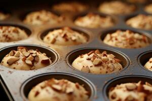 Vanilla cupcakes with nuts in a baking dish. AI-Generated photo