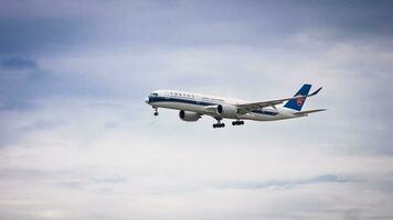 Bangkok, Thailand - August 26, 2023 China southern airlines prepare for Landing at Suvarnabhumi Airport, Thailand photo