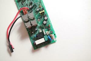 Power Supply modern printed-circuit board with electronic components with transistor. Electrical engineering. photo