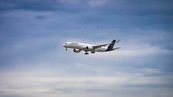 Bangkok, Thailand - August 26, 2023  Lufthansa Airways prepare for Landing at Suvarnabhumi Airport, Thailand. photo