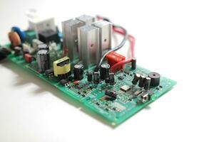 Power Supply modern printed-circuit board with electronic components with transistor. PCB detail photo