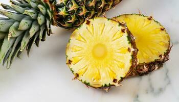 macro shot of sliced pineapple on white marble table top view photo