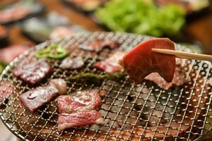 Savory Grilled Delights Japanese-Style BBQ Party with Delectable Grill Platter and Meat Arrangements photo