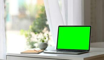 Laptop green screen, background green photo