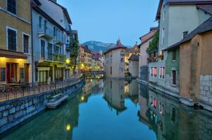 Quai de l'Ile and canal in Annecy old city, France, HDR photo