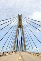 View of the sea crossing bridge with clear clouds photo