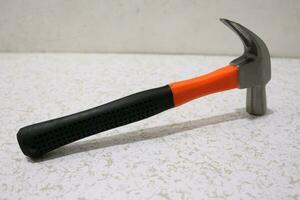 Claw hammer with black handle photo