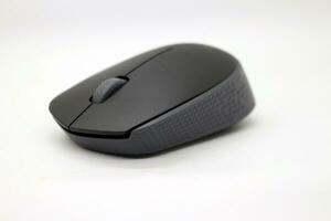 Wireless mouse on a white background photo