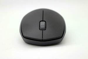 Wireless mouse on a white background photo