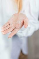 Dental care. The doctor of the orthodontist has aligners in the palm of his hand to align his teeth photo