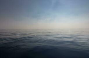 Blue water surface background photo