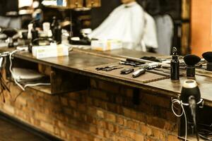 accessories for haircuts are on the shelf in the salon photo