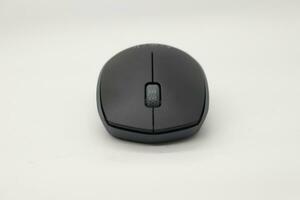 Wireless mouse on a white background photo