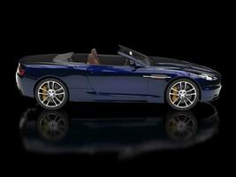 Dark blue convertible sports car on reflective background - side view photo