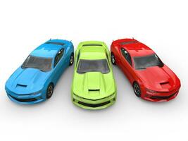 Red, green, blue modern fast cars - top down view - 3D Illustration photo