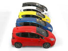 Modern compact electric cars in various colors photo