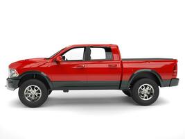 Powerful red modern pick-up truck - side view photo