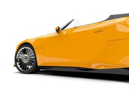 Cadmium yellow modern convertible super sports car - door closeup shot photo