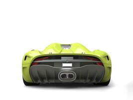 Super lime green modern supercar - back view photo