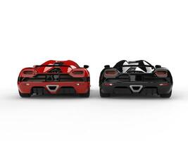 Shiny new black and red sport concept cars - back view photo