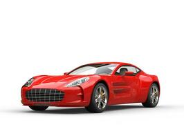 Red sports car - beauty studio shot - isolated on white background photo