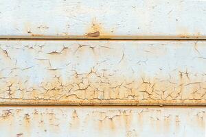 rusted and scratched white metal panel background photo