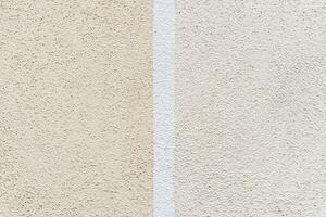 concrete wall texture detail - Natural stucco surface pattern background painted in two pastel photo