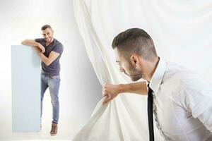 businessman pulls the curtain and discovers a man showing sign photo