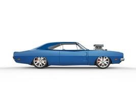 Vintage blue muscle car - side view photo