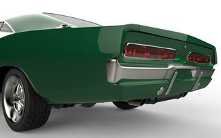 Green muscle car - focus on the tail section of the car - isolated on white background. photo