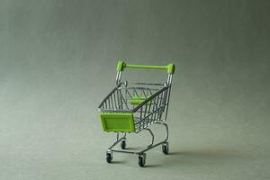 Mini Shopping Cart. Business and e-commerce concept photo