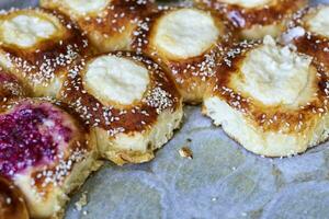 Freshly baked raspberry and cottage cheese buns photo