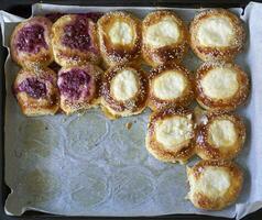 Freshly baked raspberry and cottage cheese buns photo