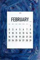 February 2020 simple calendar on trendy classic blue color photo