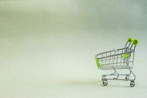 A Shopping Cart with cooy space photo