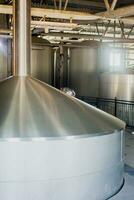 brewery stainless steel tanks. business concept brewed beer, beer production photo
