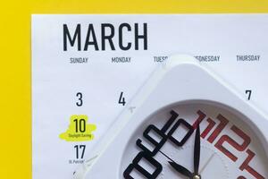 10th march 2020. Daylight saving day highlighted marked on March calendar photo