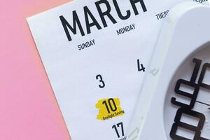 10th march 2020. Daylight saving day highlighted marked on March calendar photo