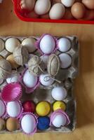 Colorful easter eggs in carton photo