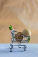 Eggs in shopping cart photo