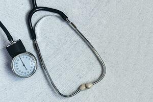 Stethoscope, phonendoscope on the marble photo