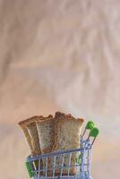 Sliced bread in shopping cart photo