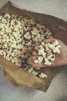 Popcorn with paper on the marble photo