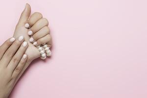 Woman hands showing beautiful manicure photo