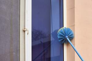 Cleaning window dust photo