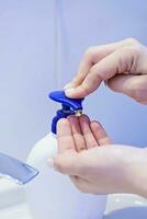 Woman washing hands photo