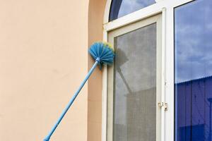 Cleaning window dust photo