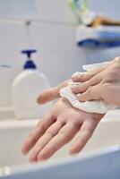 Woman washing hands photo