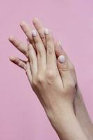 Woman hands showing beautiful manicure photo