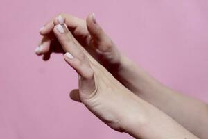 Woman hands showing beautiful manicure photo